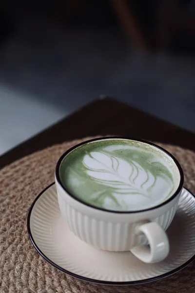 Matcha drink with latte art