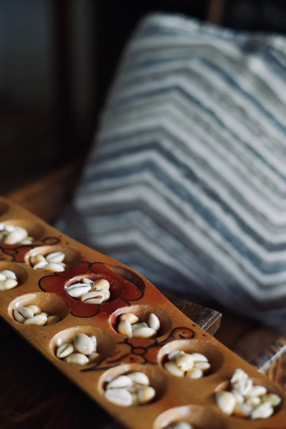 A sungka board game ready to play