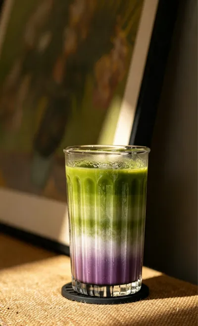 Iced ube matcha layered drink